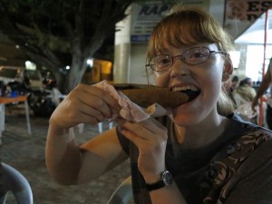 Danae Eating Meat on a Stick