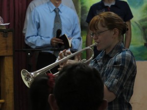 Danae Playing Trumpet