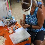 Lady Writing on Rice