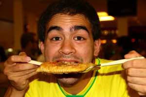 Eating Brazilian Pastel
